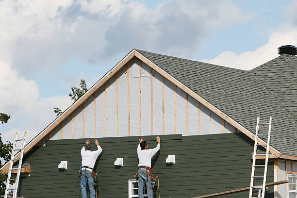 Professional Siding Contractor technician working in Massapequa, NY